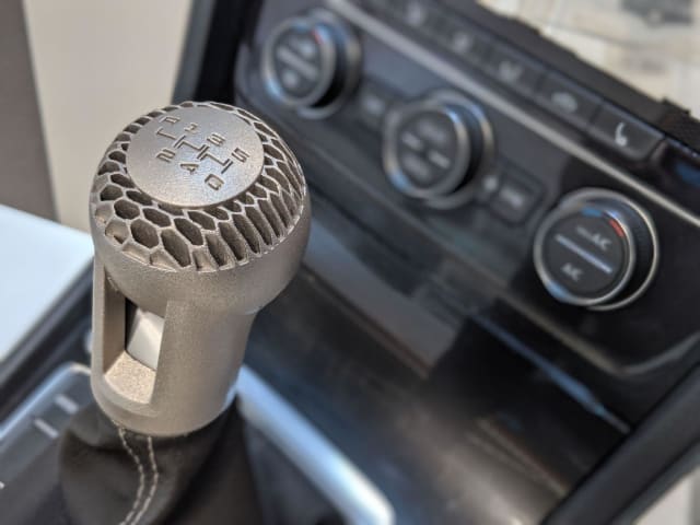 [HP Metal Jet creates a sleek shifter for Volkswagen at IMTS 2018 // Image source: Author]